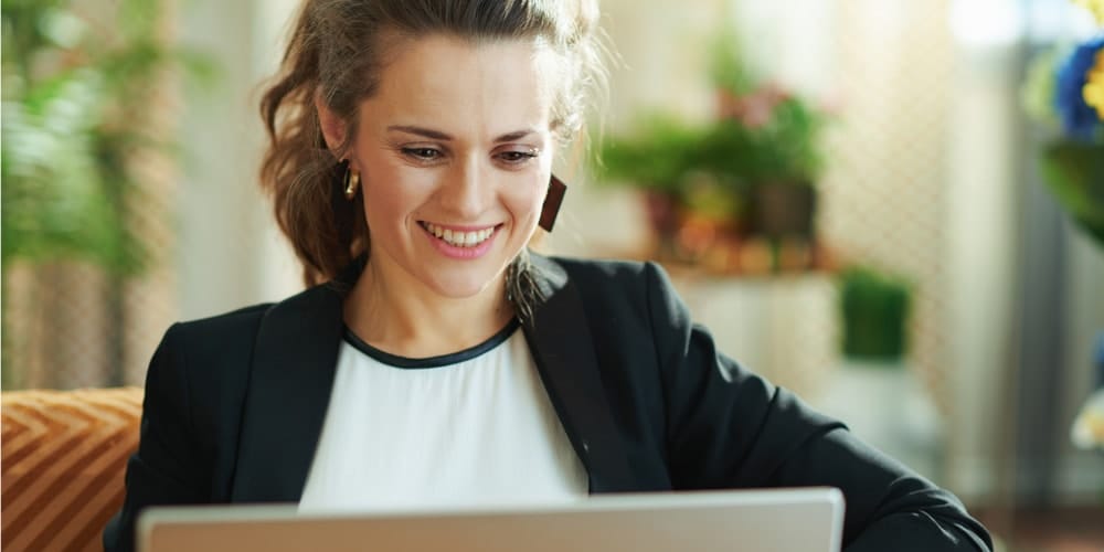 Woman looking at a laptop